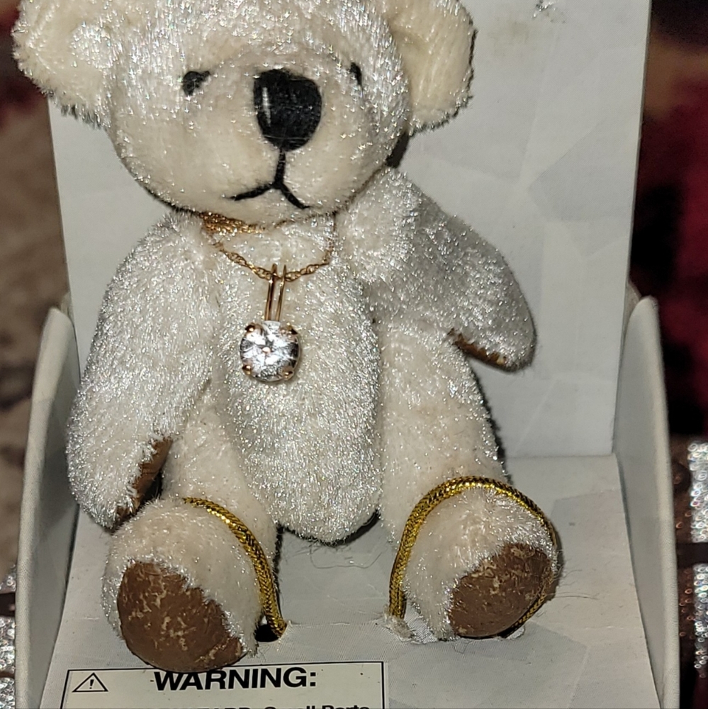 April bear with a crystal necklace